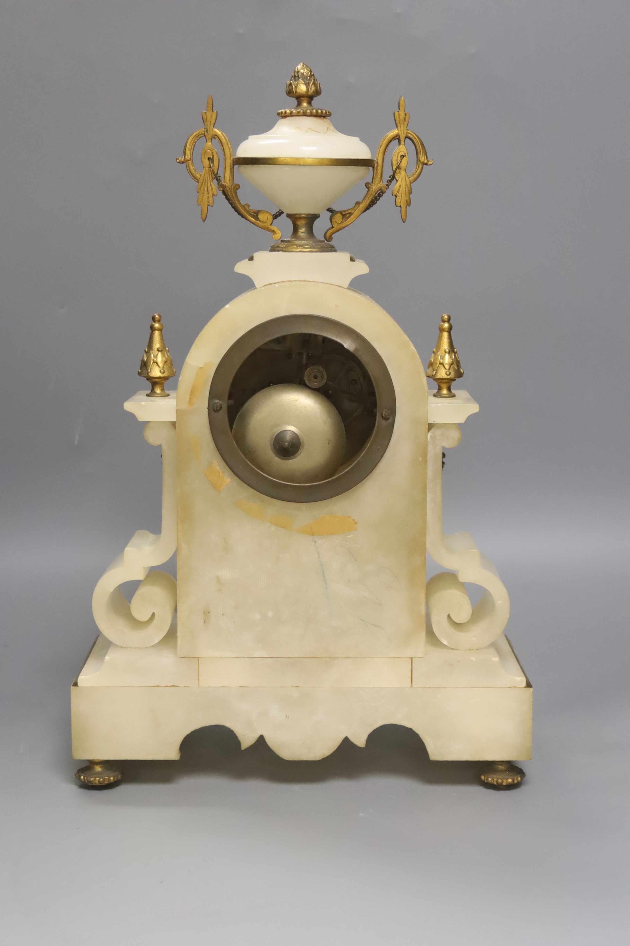 A French alabaster and gilt metal mounted mantel clock, 36.5cm